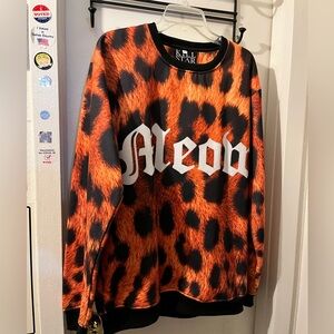 Killstar- size XL- black/orange pullover top with MEOW on it. EUC.